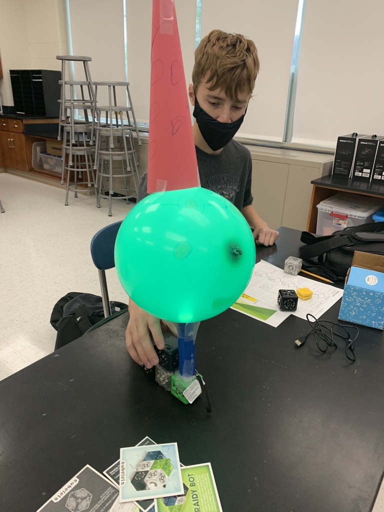 Student with their cubelet robotic balloon float