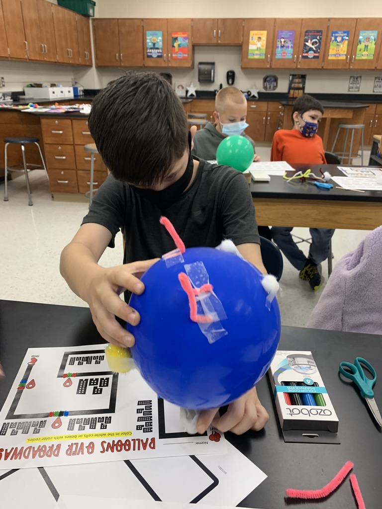 Student with their cubelet robotic balloon float