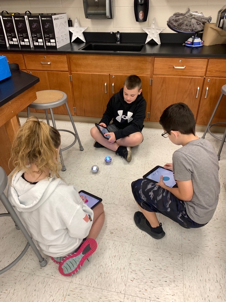 students learning to code with robots 