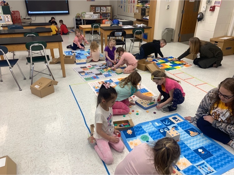 students learning to code with robots