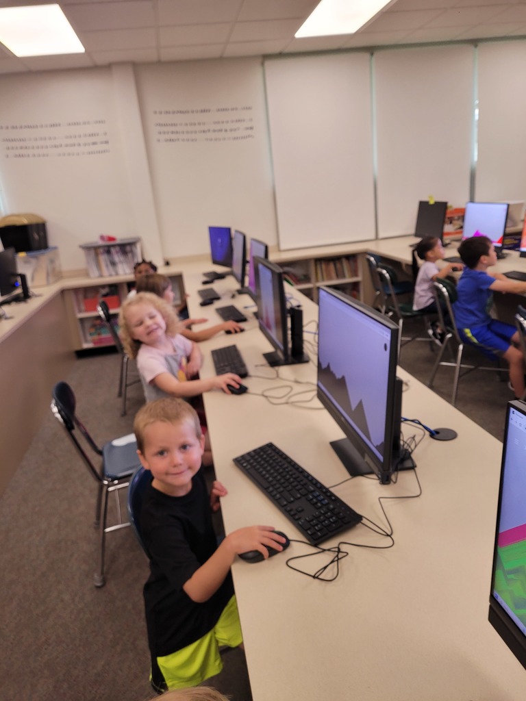 kids in a computer row